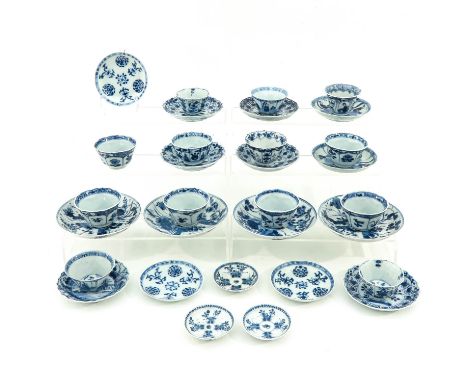Including 13 cups and 18 saucers, in a variety of decors, including 18th Century, largest saucer is 13 cm. in diameter, chip 