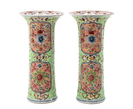 Light green ground decorated with flowers in Famille Rose enamels, 24 cm. in diameter, one with restoration on rim.