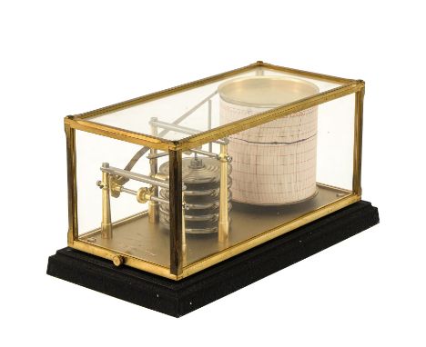 Zenith, in a brass and glass case, serial number 628, 24 x 11 x 12 cm.