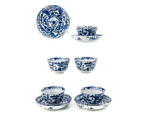 Including 5 cups and 4 saucers in blue and white floral decor, saucers are 13 cm. in diameter, in diverse conditions.