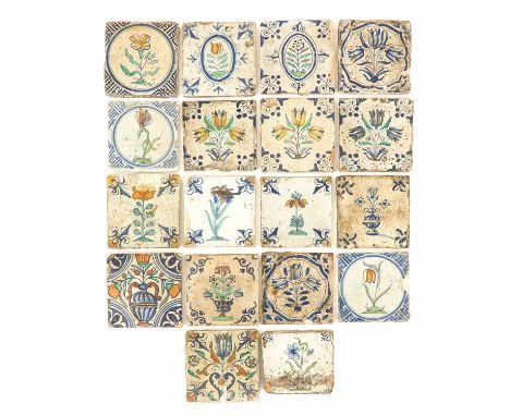 18 tiles, incl. 17th century tulip tile, 13 x 13 cm.