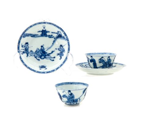Depicting a scene in a garden with Chinese hunters on horseback, saucers are 11 cm. in diameter, chip and hairline.
