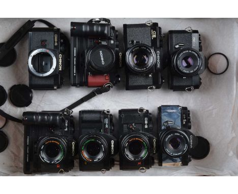 A Tray of SLR Cameras, a Chinon CE Memotron, three CE-5, one CP-X Program, Cosina PM-1, CT-1A, all with prime lenses, and Chi