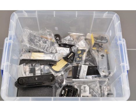 A Box of Nikon F Camera Parts, chrome & black parts, including, top plates, base plates, film doors, name plates, camera fron