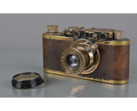 SALEROOM ANNOUNCEMENT - Estimate has changed from £200-£300 to £150-£250.A Leitz Wetzlar Leica II Model D Camera, black, seri