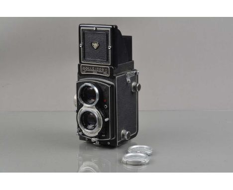 A Rolleicord V TLR Camera, serial no 1557256, shutter not working, very slow to close, not cocking, body G, light paint wear 