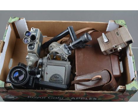 A Group of 8mm Cine Cameras, a Nizo Heliomatic 8, motor not running, Canon 514XL-S, G, untested, Eumig C3, AF, Emel, AF and a