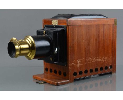 An incomplete Newton & Co Magic Lantern, missing chimney, illuminant & back, with condenser, rack & pinion focusing brass len