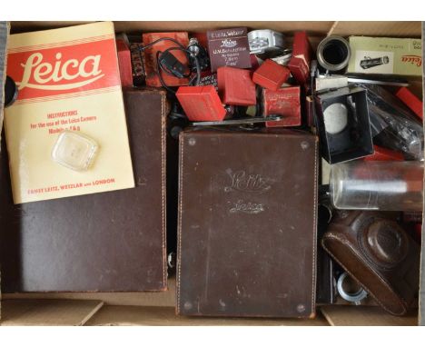 A Tray of Leitz Accessories, including ETGUS case, G, with four filters & two 35mm canisters, Vacu synchroniser, Meter M, met