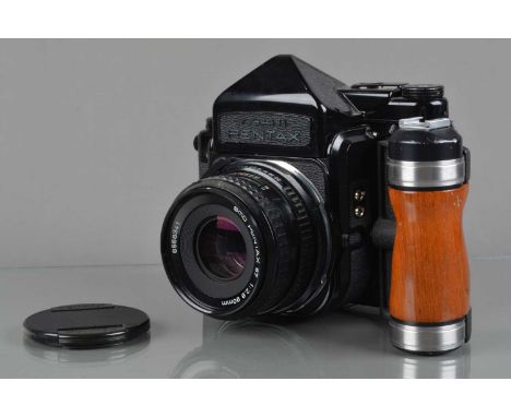 An Asahi  Pentax 67 Camera,  shutter working, body G-VG, light wear, with Asahi Pentax TTL Pentaprism finder, finder responsi