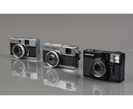 Three Olympus Cameras, a Pen EF, shutter working, light cell responsive, flash not working, Pen EED, shutter forest, shutter 