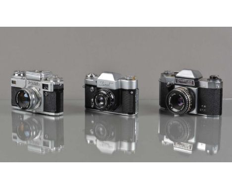Three Eastern Bloc 35mm Cameras, a Kiev 4, shutter sluggish, light cell unresponsive, with Jupiter53mm f/2 lens, Zenit 3, shu