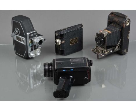 A Group of Cine Cameras a Campro 9.5mm cine camera/projector, motor runs, G, Bell & Howell 627 16mm cine camera, motor not ru