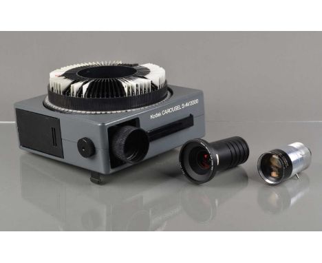 A Kodak Carousel S-AV2000 Slide Projector,  untested, with Kodak Retinar S-AV 2000 51mm f/2.8 & Leitz Wetzlar 90mm f/2.5 CF C