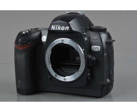 A Nikon D70 DSLR Camera Body, shutter working, flash working, appears to function as should, body G, with three compact flash