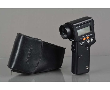 A Minolta Spotmeter F Exposure Meter, powers up, appears to function as should, G-VG, in case, with photo copied manual