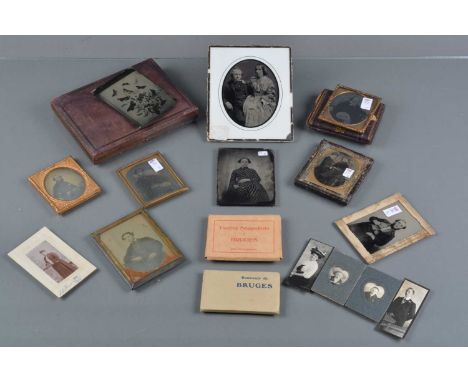A Group of Ambrotypes, three showing couples, four male portraits, one portrait of a lady and a tinplate photo of couple, all