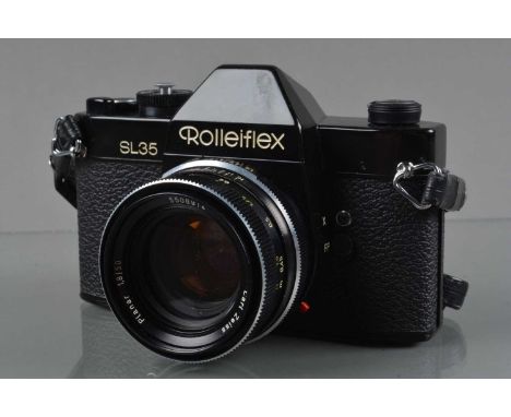 A Rolleiflex SL35 SLR Camera, shutter working, self timer working, meter unresponsive, body G, with Carl Zeiss 50mm f/1.8 Pla