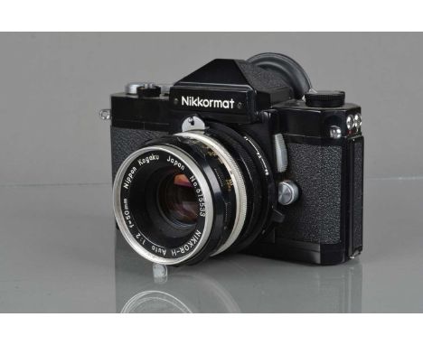 A Nikon Nikkormat FTn SLR Camera, black, serial no 4583574, shutter sticking bellow one quarter second, meter responsive, sel