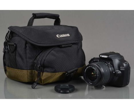 A Canon EOS 1100D DSLR Camera, shutter working, flash working, appears to function as should, body G-VG, with EF-S 18-55mm f/