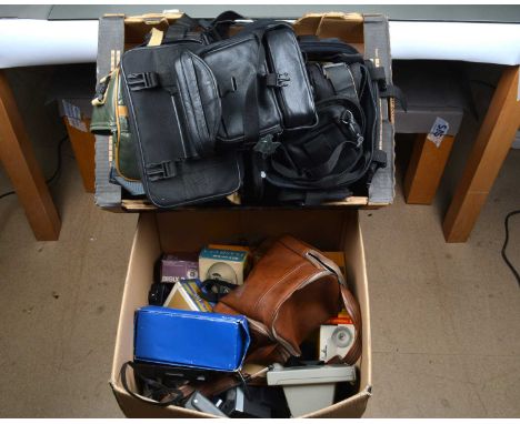 A Box of Camera Related Accessories, including, tripods, hoods, caps, flash units, Drives, light meters, bulbs, rangefinders,