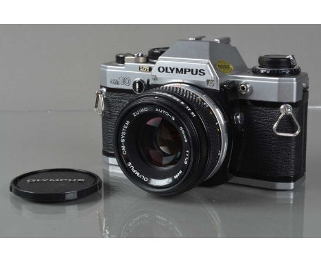 An Olympus OM-10 SLR Camera, shutter working, meter responsive, responsive in auto, self timer working, body G, with Zuiko 50