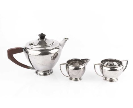 A silver three piece tea service, the teapot with angular composition handle and knop, by Mappin &amp; Webb 1965 and 1967, th