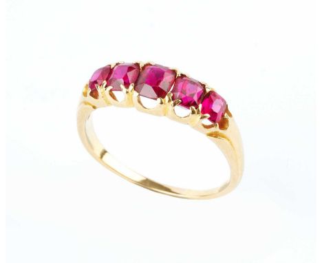 A ruby five stone ring, the graduated cushion-shaped mixed-cut rubies in fancy claw setting, yellow precious metal mounted, s