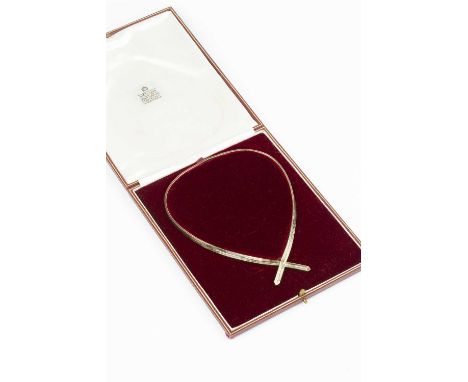 A 9ct gold collar necklace, modelled as a ribbon of textured and articulated design, with crossover clasp to front, with Birm
