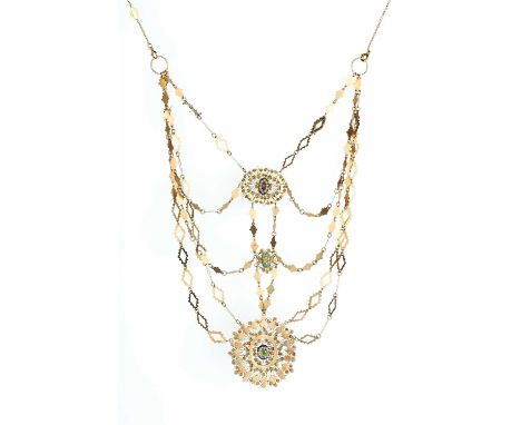 A collection of jewellery, comprising an Eastern pendant necklace, centred with a trio of openwork scrolled wirework panels, 