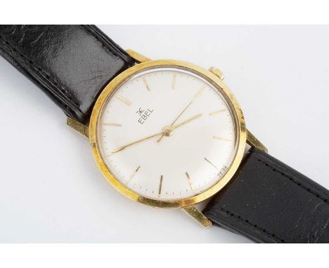 A mid-size wristwatch by Ebel, the circular silvered dial with gilt baton markers and centre seconds hand, to a jewelled manu