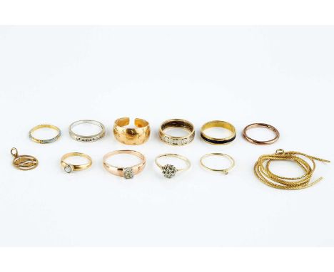 A collection of jewellery, comprising a band ring, with blue enamel decoration, stamped '750', a tapered band ring, with star