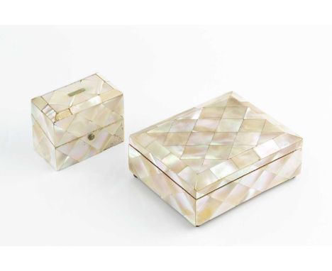 A late 19th century French mother of pearl veneered rectangular box,  fitted with a pair of faceted glass scent bottles, 6.5c