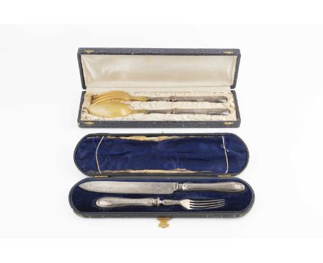 A mid Victorian silver serving knife and fork, with stylised foliate engraved decoration, by Joseph Rodgers &amp; Sons, Sheff
