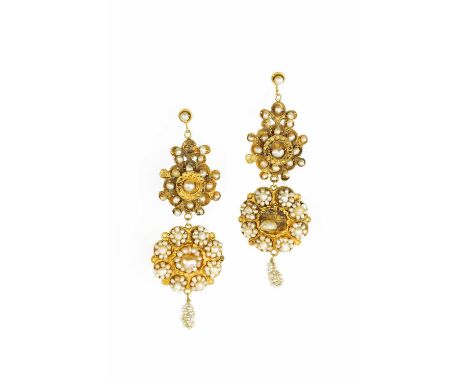A pair of 19th century Indian pearl ear pendants, each suspending two shaped circular panels of pearl clusters, with ropetwis