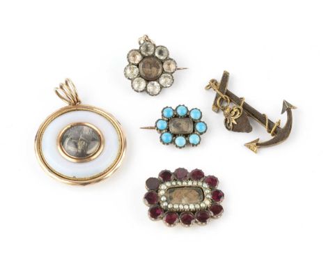 A collection of 19th century memorial jewellery, comprising a garnet, half pearl and hairwork cluster panel brooch, with foil