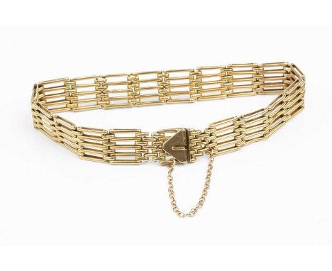A yellow precious metal gate-link bracelet, stamped '9ct', length 18cmCondition report: General surface wear, scuffs and nick