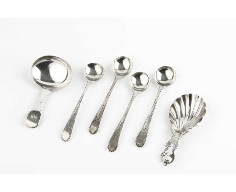 A 19th century silver caddy spoon, with foliate pierced and engraved handle, and scalloped bowl, maker's mark only W.B., 8cm,