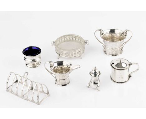 A collection of silver, comprising a seven bar toast rack, by Selfridge &amp; Co Ltd, Birmingham 1929, a pierce decorated cir