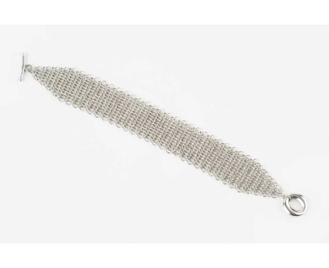 A fancy-link bracelet designed by Elsa Peretti for Tiffany &amp; Co., of mesh-link design, with T-bar fitting, signed Elsa Pe