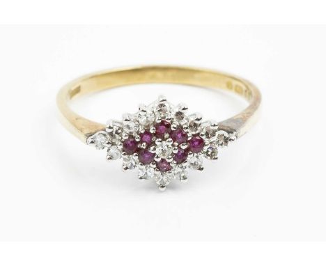 A ruby and diamond cluster ring, the tiered lozenge-shaped cluster of circular mixed-cut rubies bordered by single-cut diamon