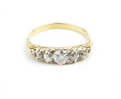 A diamond five stone ring, the scrolled hoop set with graduated old and Swiss-cut diamonds, spaced by single and rose-cut dia