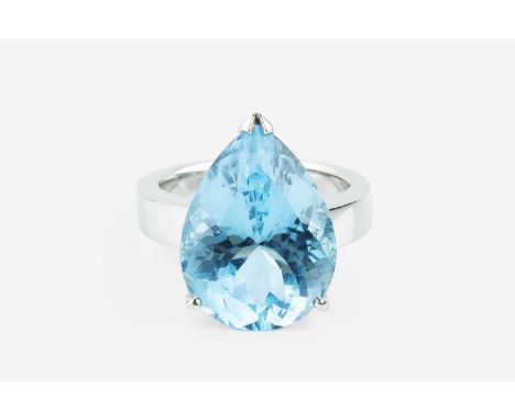 A blue topaz single stone ring, the pear-shaped mixed-cut blue topaz in claw setting, white precious metal mounted, stamped '