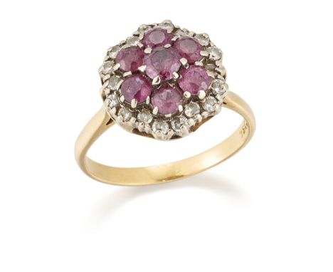 A gold ruby and diamond cluster ring, a central daisy cluster of circular-cut rubies, with an outer border of brilliant-cut a