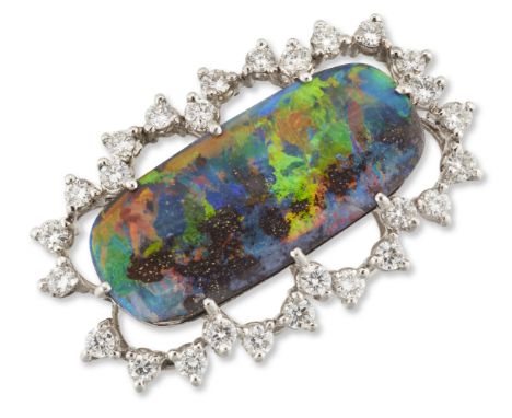 A boulder opal and diamond cluster, the claw-set oval boulder opal to surround of brilliant-cut diamonds, length 3.4cm (VAT c