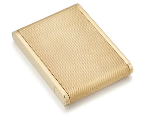 Cartier. A 9ct gold powder compact, with engine turned reeded decoration, the interior with mirror and powder compartment, si