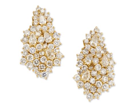 A pair of diamond earrings, of cluster design, claw set with marquise-cut and brilliant-cut diamonds, to post and hinged clip