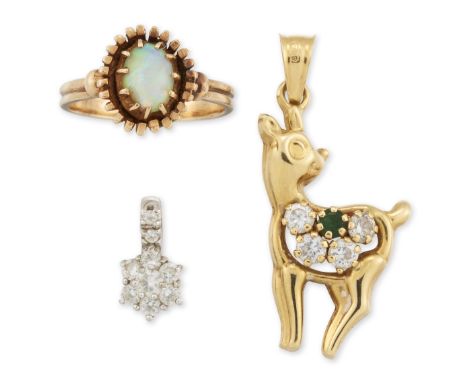 A small group of jewellery, comprising: a single stone opal ring, ring size I½; a paste set pendant in the form of a deer; an