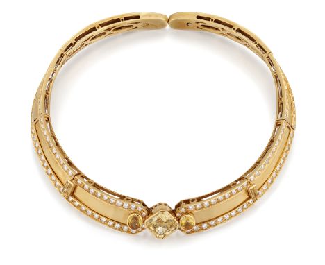 A diamond and yellow sapphire collar, the central square-cut collet-set yellow sapphire framed by two collet-set oval yellow 