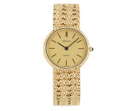 Zenith/Movado. A 14ct gold quartz bracelet watch, Circa 1990Zenith/Movado quartz movement, champagne coloured circular dial w